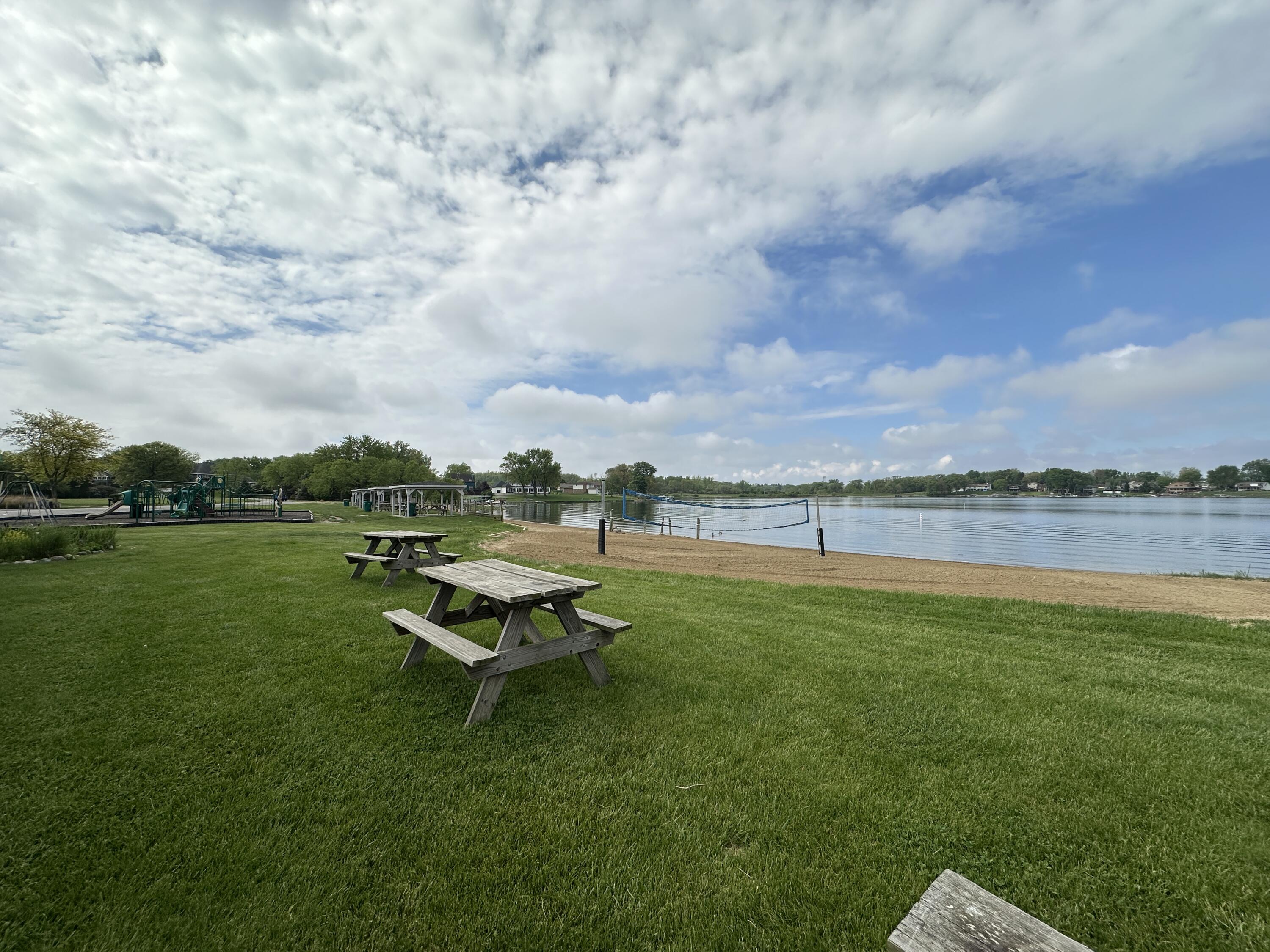 1100 Country Club Drive Crown Point, IN 46307 - Photo 14 of 24 a view of a lake with a garden