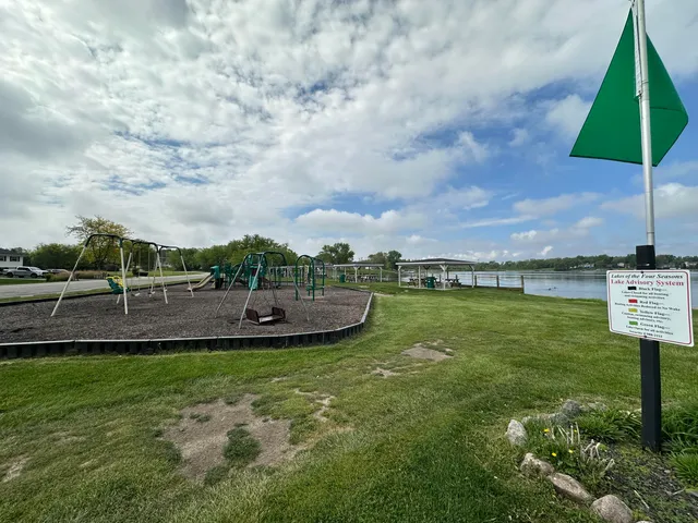 a view of a lake with a yard