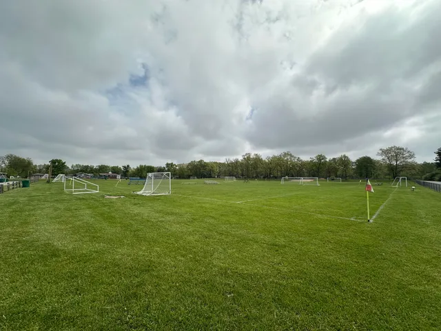a view of a field with clear sky