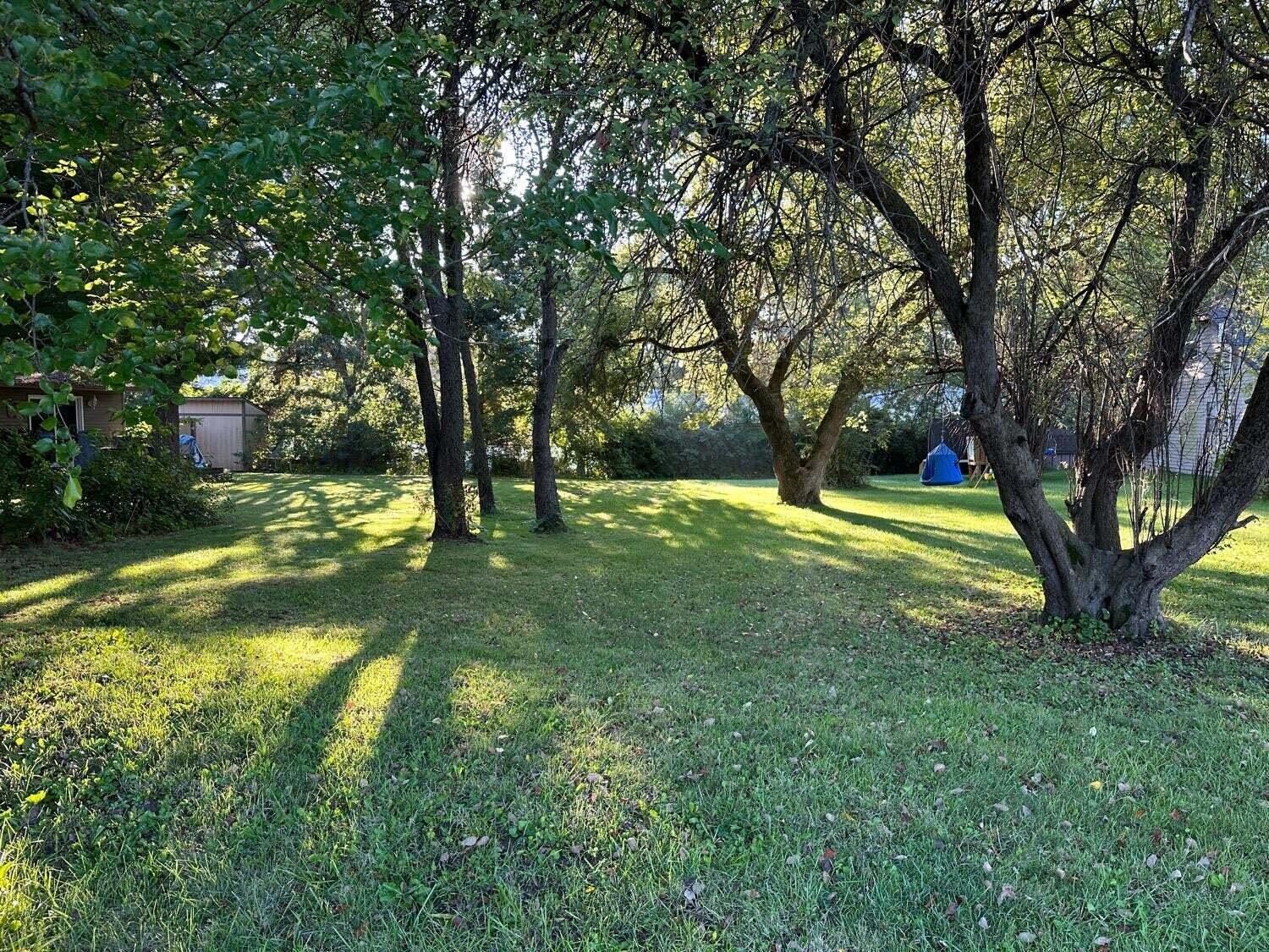 1100 Country Club Drive Crown Point, IN 46307 - Photo 3 of 24 a view of swimming pool with a yard
