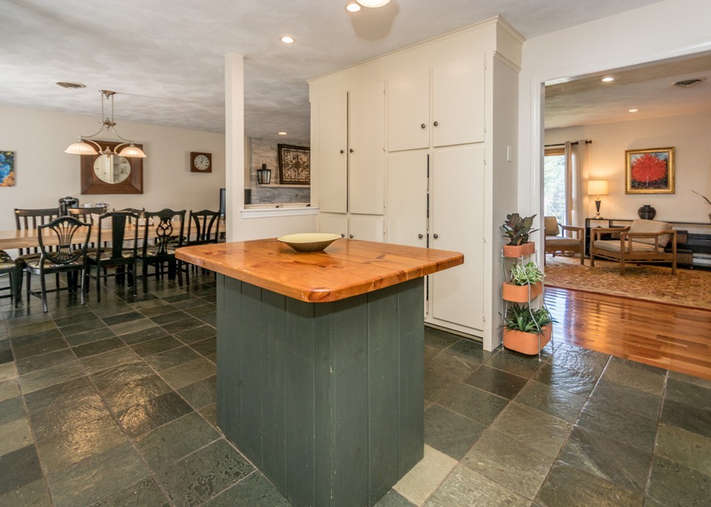 51 Mary Chilton Road Needham, MA 02492 - Photo 11 of 25 a kitchen with stainless steel appliances granite countertop a sink and a stove
