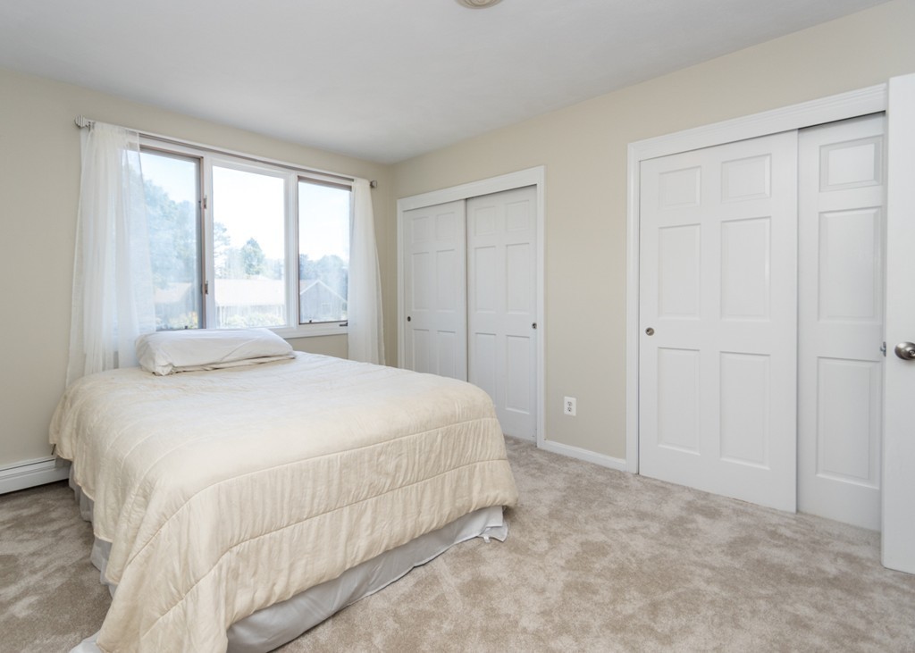 51 Mary Chilton Road Needham, MA 02492 - Photo 13 of 25 a bedroom with a bed and a window