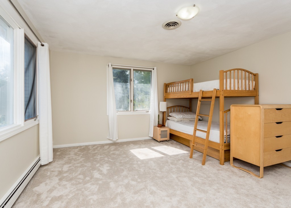 51 Mary Chilton Road Needham, MA 02492 - Photo 14 of 25 an empty room with windows and closet