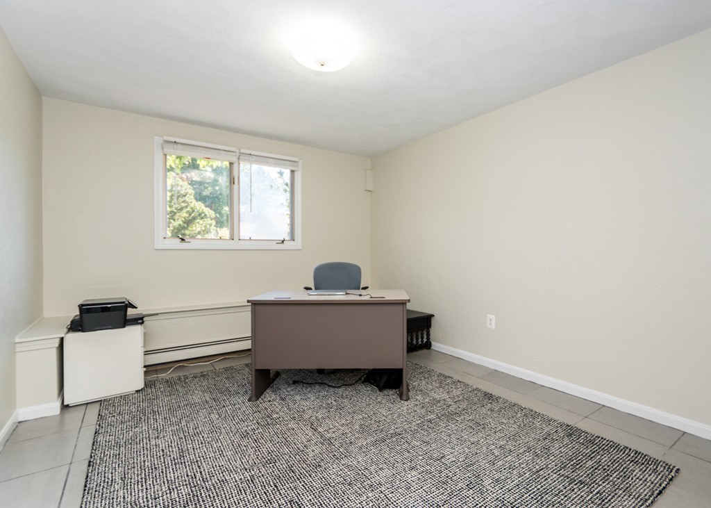 51 Mary Chilton Road Needham, MA 02492 - Photo 20 of 25 a living room with furniture and window