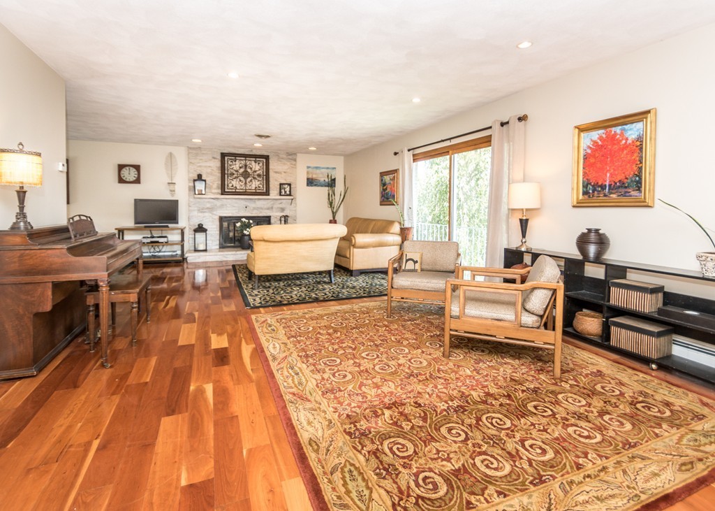 51 Mary Chilton Road Needham, MA 02492 - Photo 3 of 25 a living room with furniture and a rug