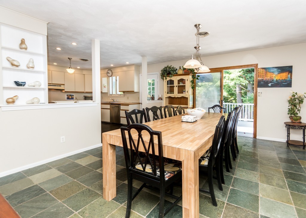 51 Mary Chilton Road Needham, MA 02492 - Photo 7 of 25 a dining room with furniture a chandelier and window