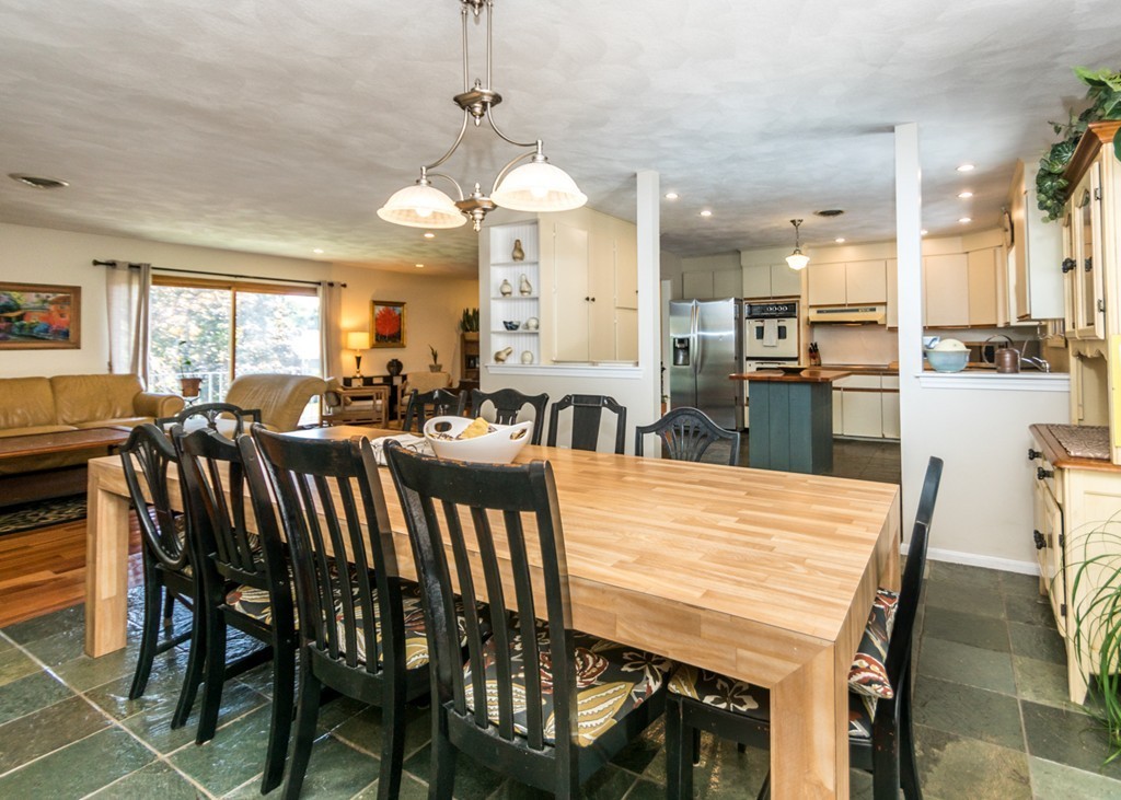 51 Mary Chilton Road Needham, MA 02492 - Photo 8 of 25 a large kitchen with a table and chairs