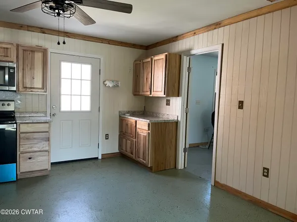 a view of hallway with washer and dryer
