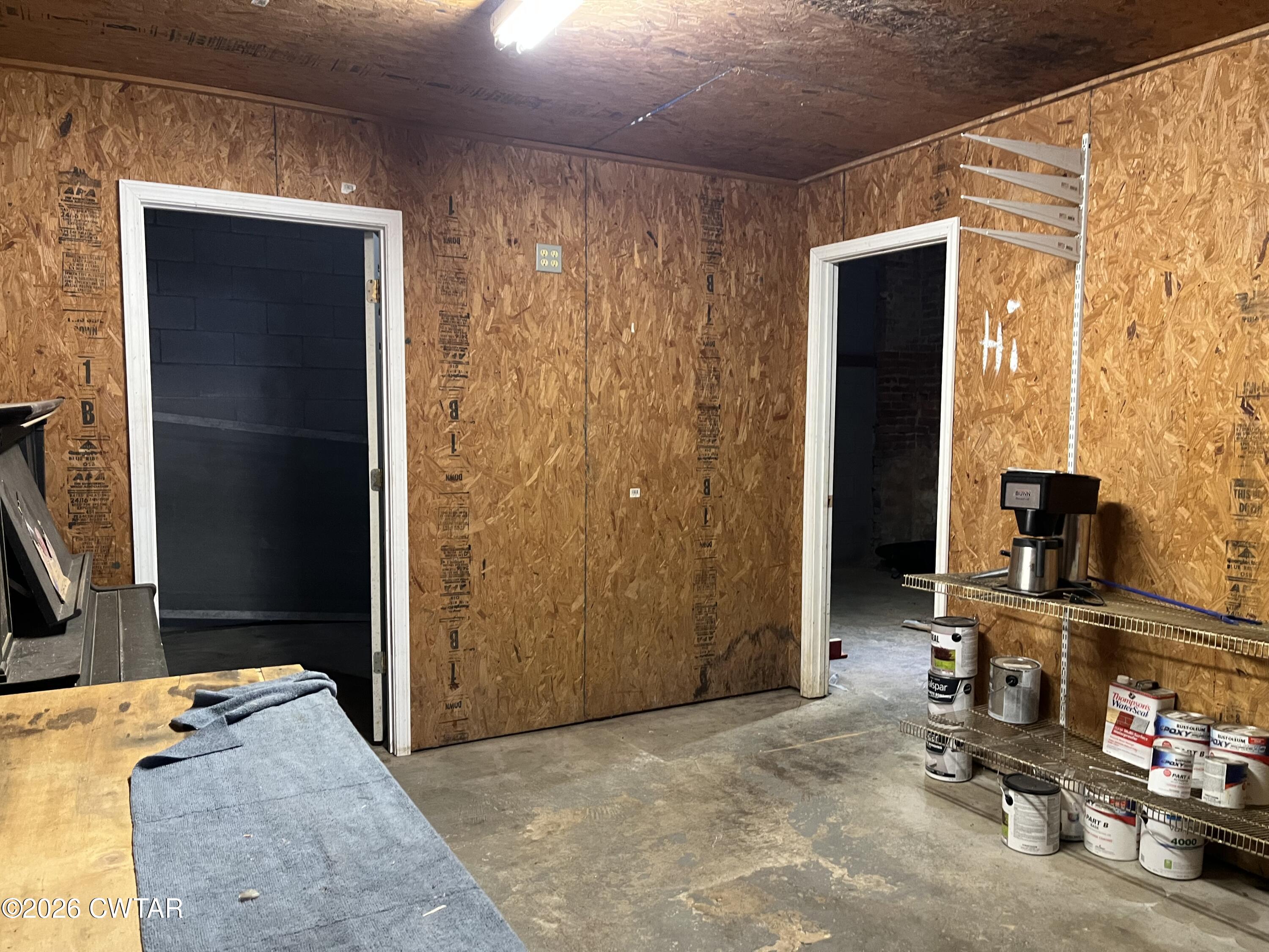 1693 Highway 138 Mercer, TN 38392 - Photo 9 of 10 a view of a hallway with workspace