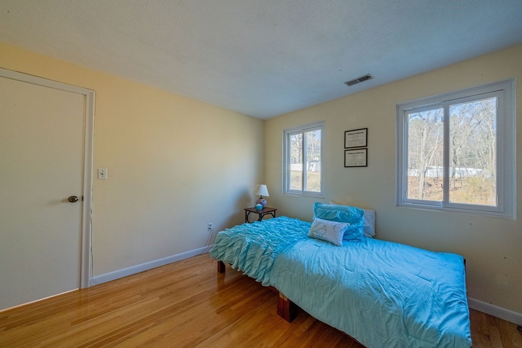 4 Springdale Road Lexington, MA 02421 - Photo 34 of 42 a bedroom with a bed and window