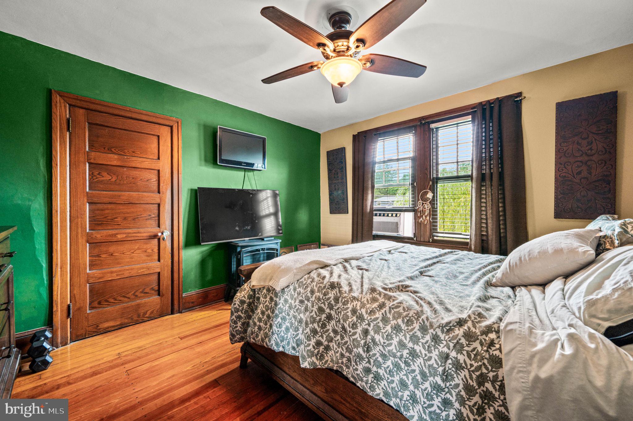 3 Township Line Road Elkins Park, PA 19027 - Photo 28 of 40 Charming bedroom with vibrant hues.