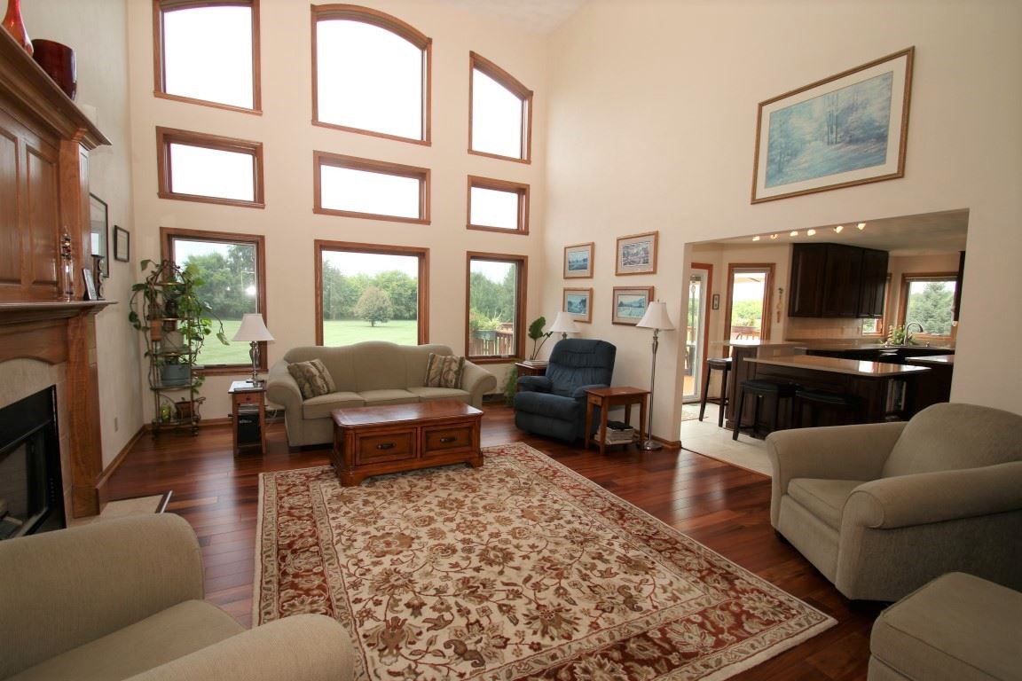 2865 Dourdan Road Belvidere, IL 61008 - Photo 5 of 24 a living room with furniture or couch and a flat screen tv