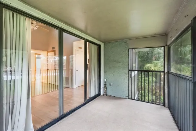 a view of a big room with large windows