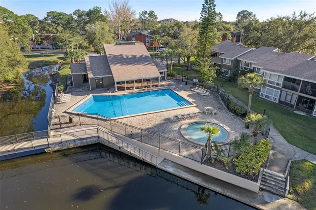 an aerial view of residential house with outdoor space