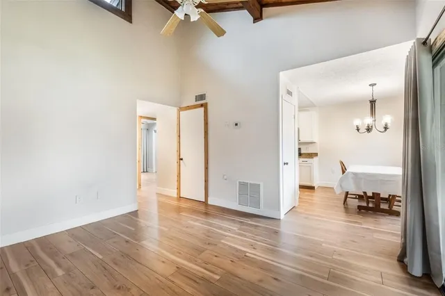 a view of a livingroom with wooden floor