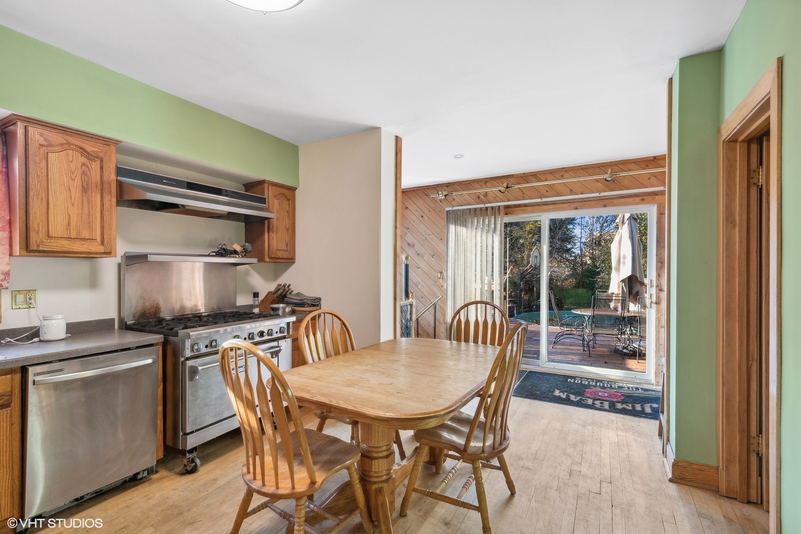 30 Northgate Road Riverside, IL 60546 - Photo 5 of 20 a kitchen with stainless steel appliances a table and chairs in it