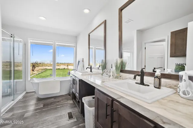 a view of a kitchen with a sink and a window