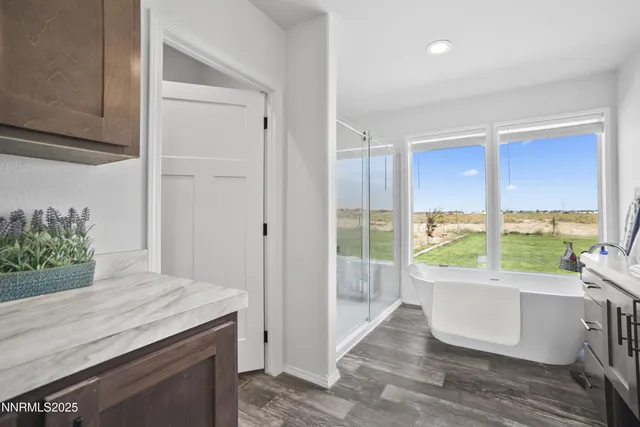 a room with a sink and a large window
