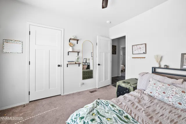 a view of workspace with wooden floor shelves