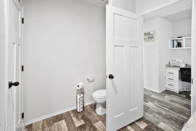 a view of a living room with a flat screen tv