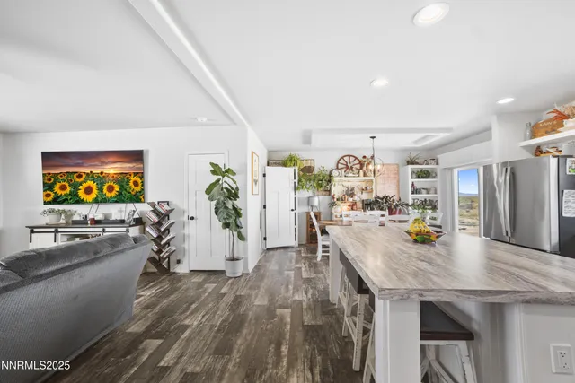 a kitchen with stainless steel appliances granite countertop a stove and refrigerator