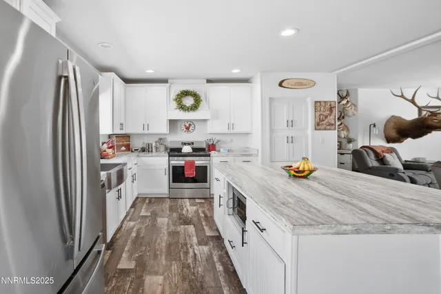 a kitchen with a stove and a refrigerator