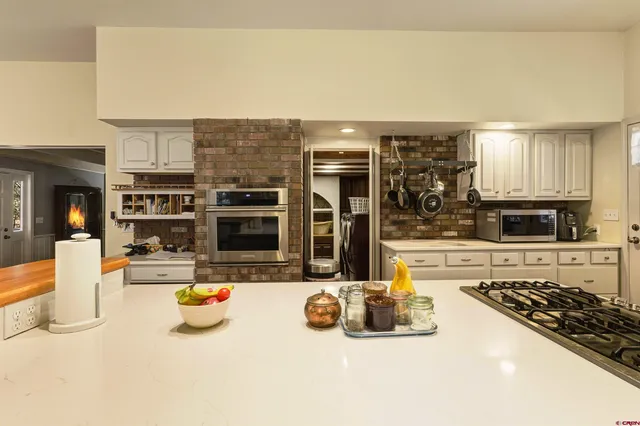 a view of a living room and dining room