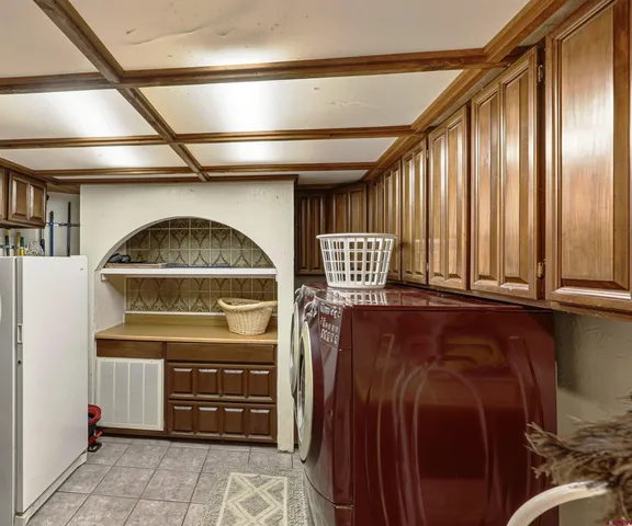 a view of an empty room with a large window