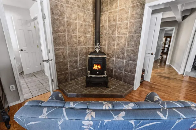 a bathroom with a double vanity sink a mirror and a bathtub