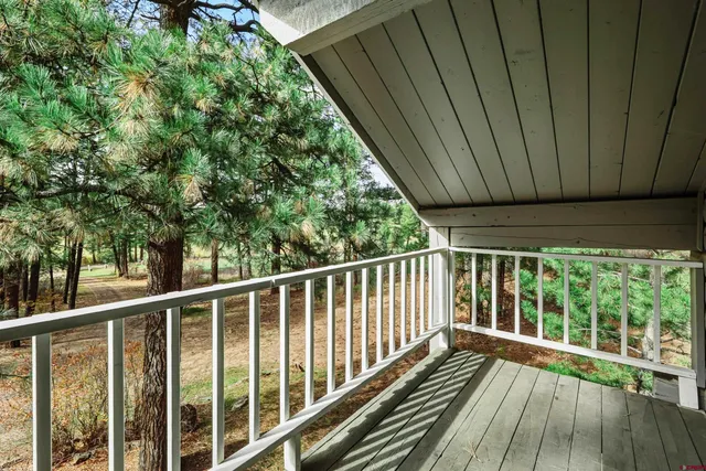 a bathroom with a sink a mirror and shower