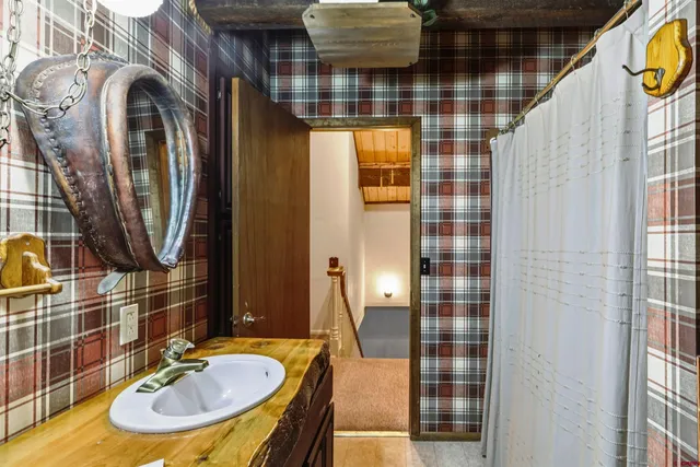 a view of a door and brick wall