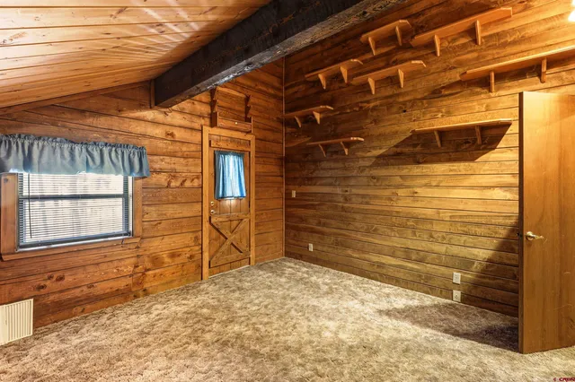 a bathroom with a toilet and a sink