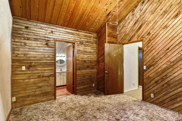 a view of a house with a yard patio and sitting area