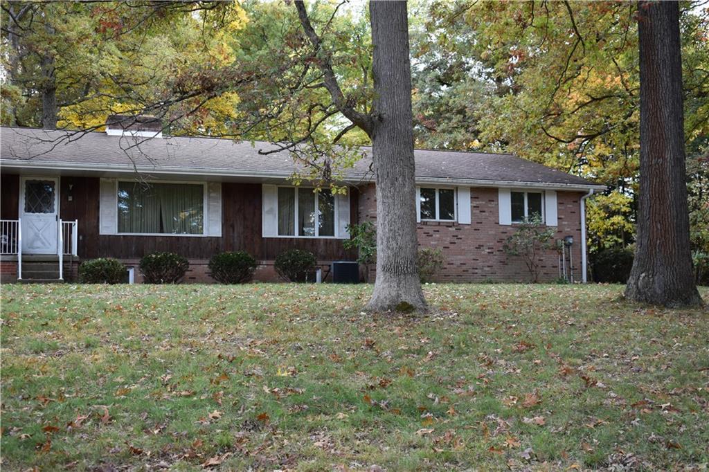 228 Harbison Road Sarver, PA 16055 - Photo 4 of 25 Front main living area and garage with a side entrance