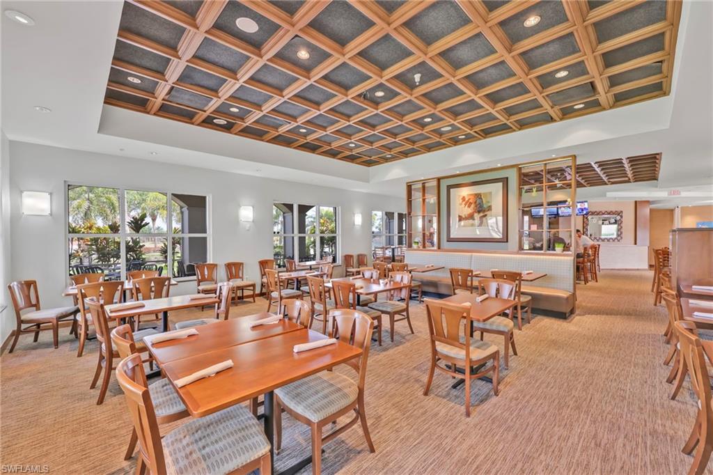 8615 Palermo Court Naples, FL 34114 - Photo 28 of 50 a view of a dining room with furniture window and outside view