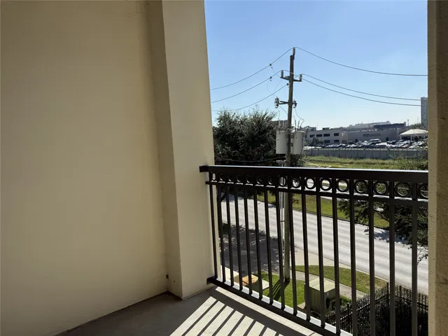 a kitchen with a refrigerator and a sink