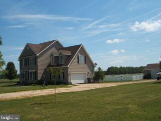7965 Richardson Road Willards, MD 21874 - Photo 13 of 13 a house view with a outdoor space