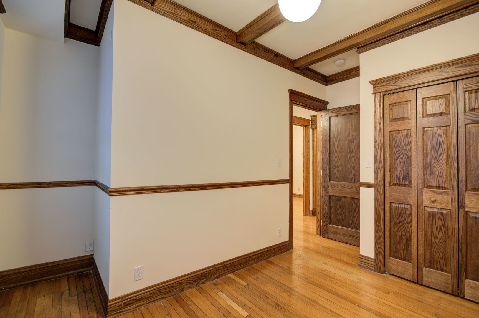845 West Sheridan Road, Unit 1 Chicago, IL 60613 - Photo 11 of 17 a view of walk in closet with wooden floor