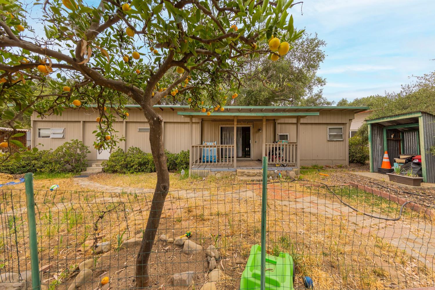 982 Oso Road Ojai, CA 93023 - Photo 15 of 21 a front view of house with yard