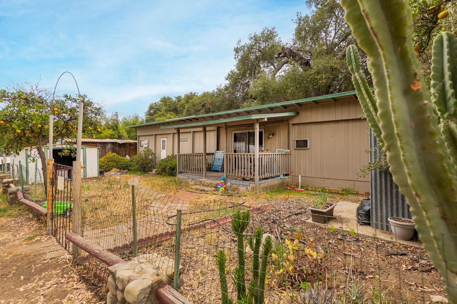 982 Oso Road Ojai, CA 93023 - Photo 16 of 21 a view of a house with backyard