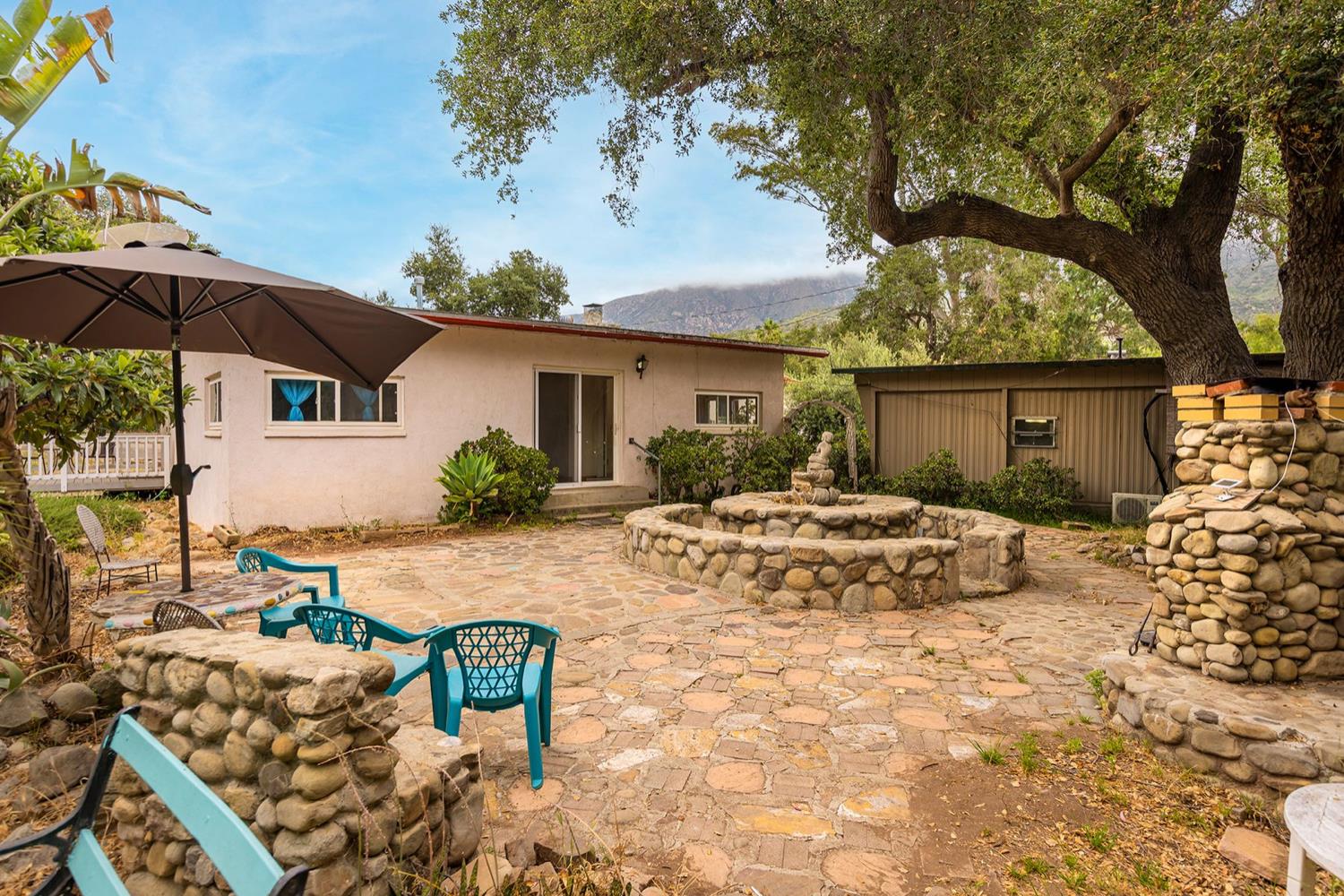 982 Oso Road Ojai, CA 93023 - Photo 5 of 21 a view of a house with backyard and sitting area