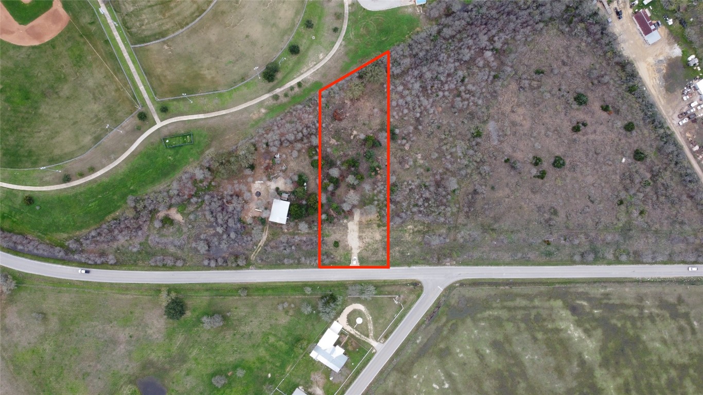 a view of swimming pool with a yard