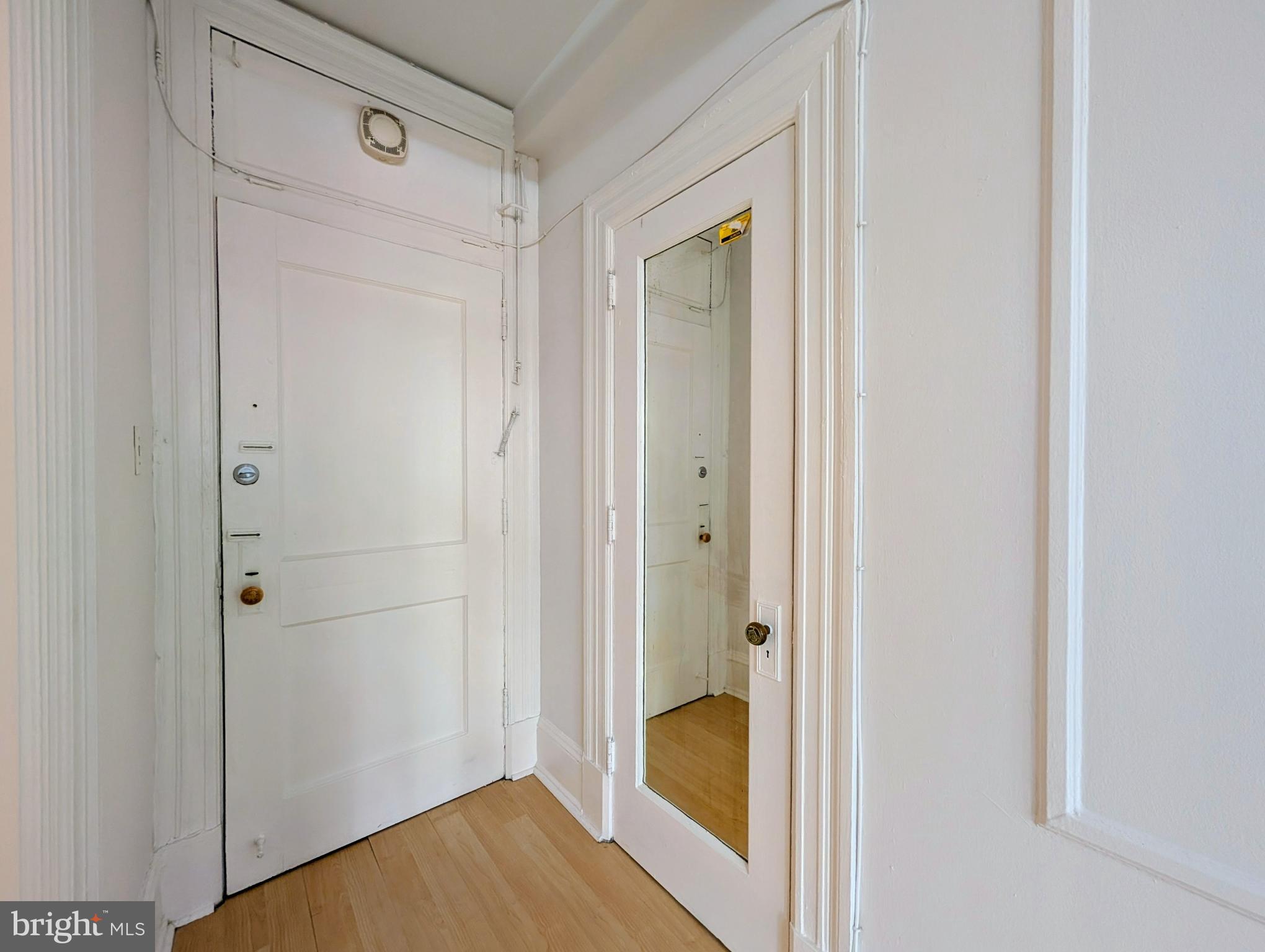 1324 Locust Street, Unit 618 Philadelphia, PA 19107 - Photo 17 of 34 a view of a bathroom from a hallway
