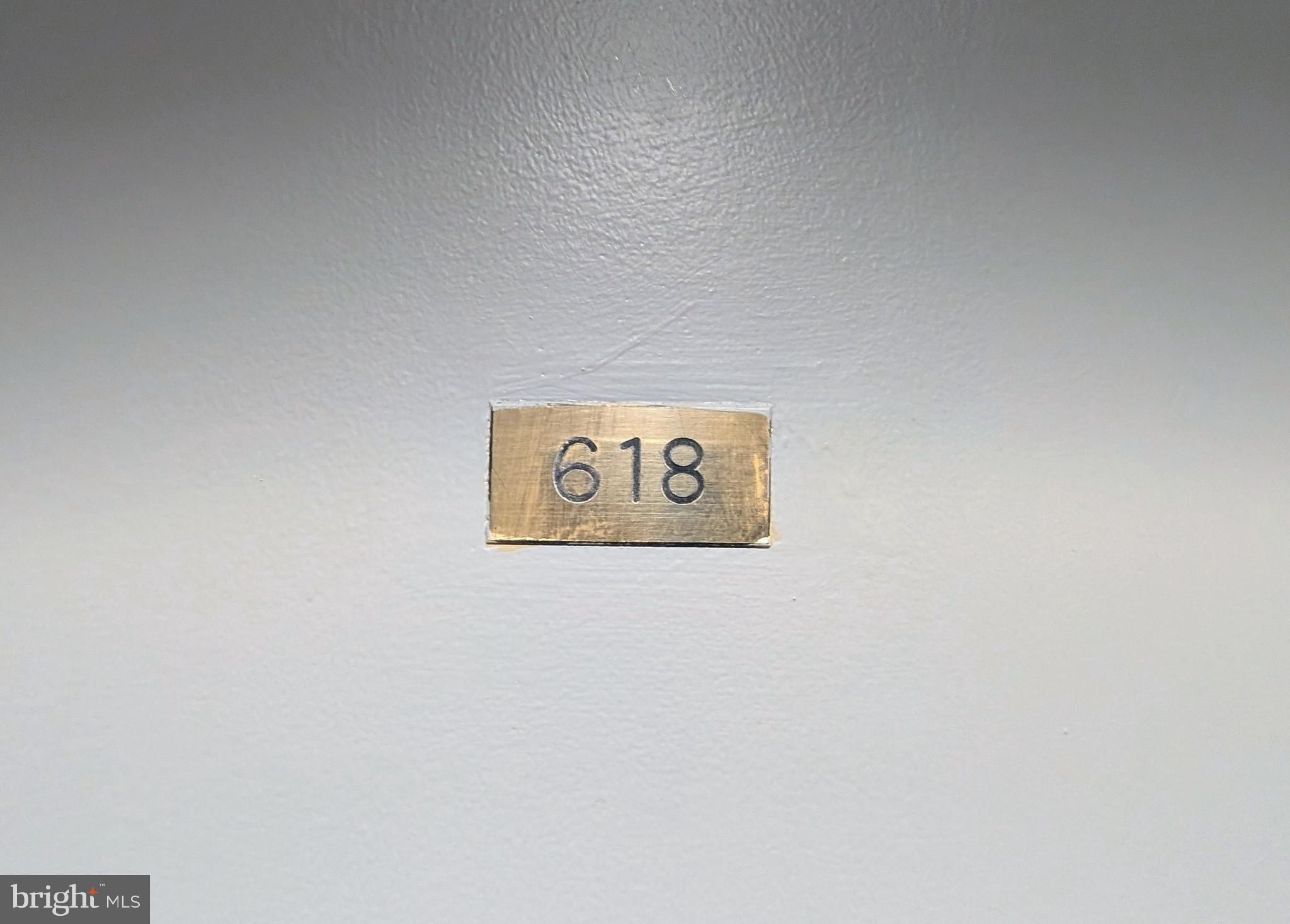 1324 Locust Street, Unit 618 Philadelphia, PA 19107 - Photo 19 of 34 a wall with a sign on it