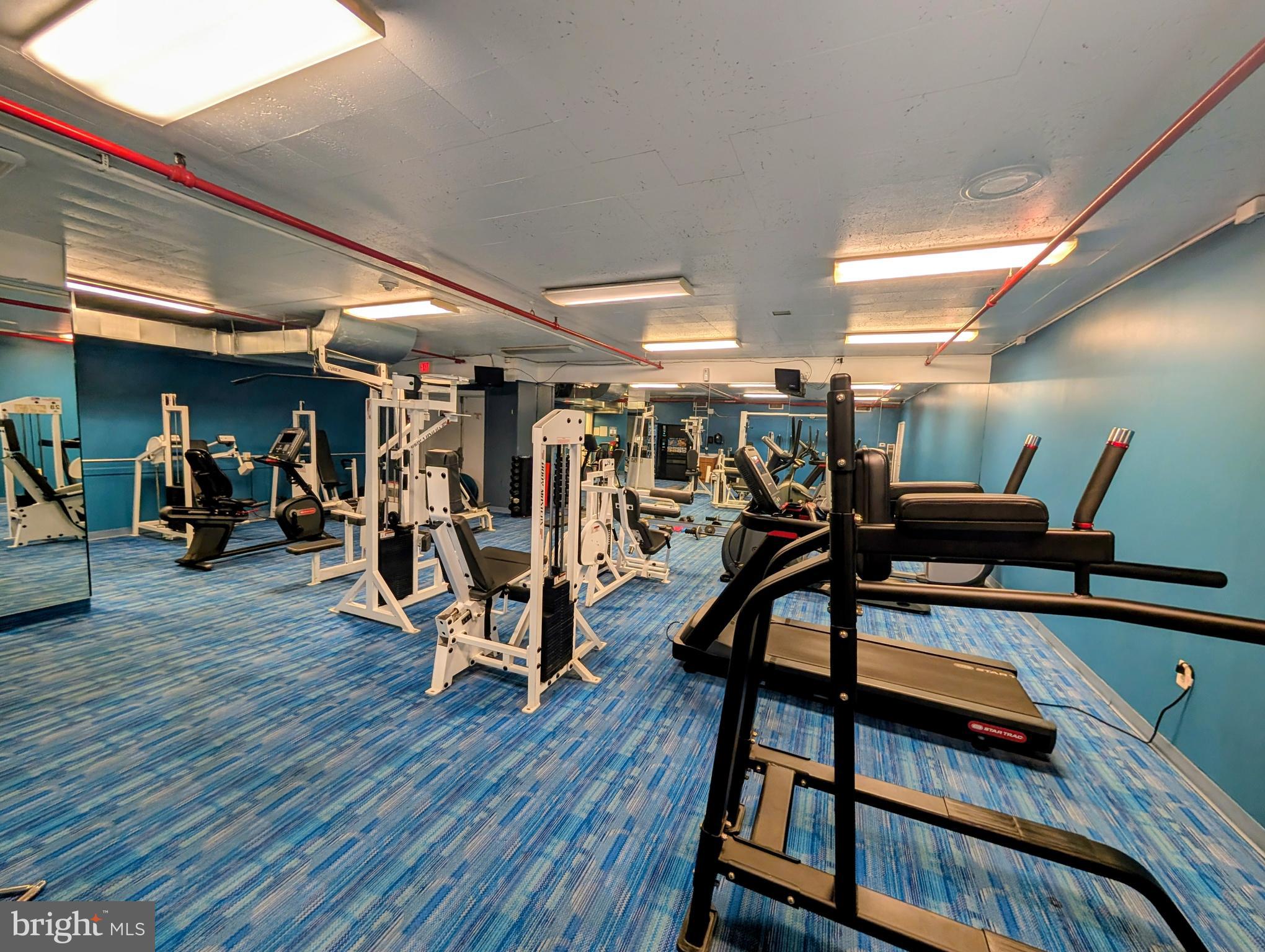 1324 Locust Street, Unit 618 Philadelphia, PA 19107 - Photo 25 of 34 a view of a room with gym equipment