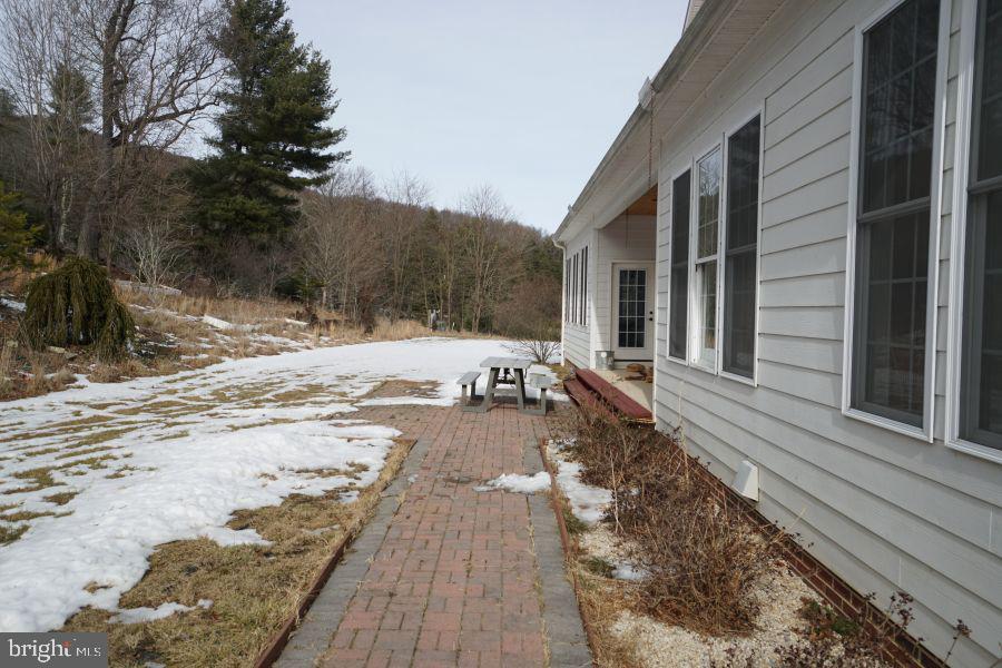 255 Troublesome Valley Road Franklin, WV 26807 - Photo 11 of 72 a view of a house with a yard