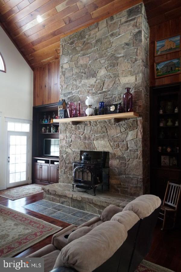 255 Troublesome Valley Road Franklin, WV 26807 - Photo 18 of 72 a living room with furniture and a fireplace