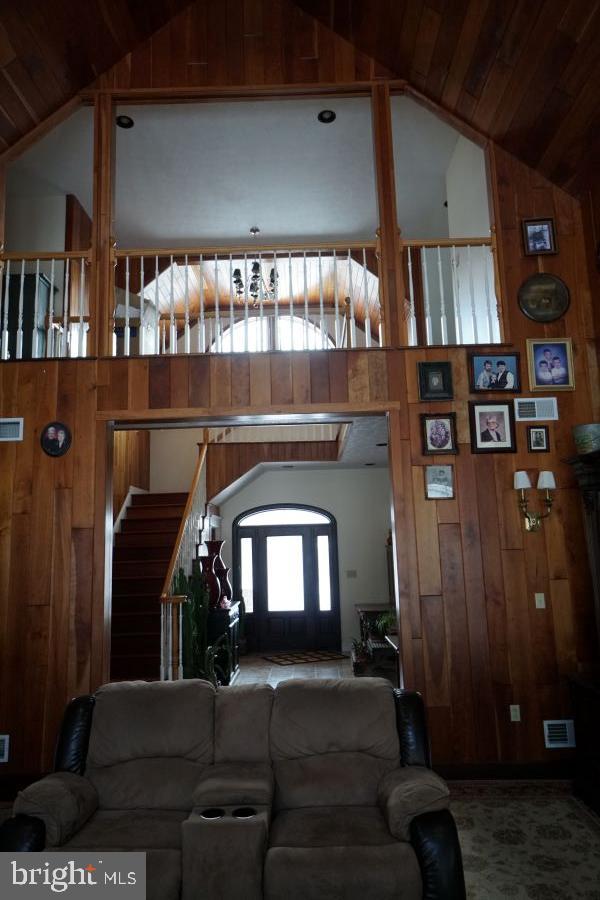 255 Troublesome Valley Road Franklin, WV 26807 - Photo 19 of 72 a living room with furniture and a fireplace