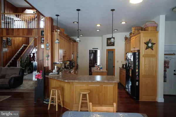 a kitchen with a stove and a microwave