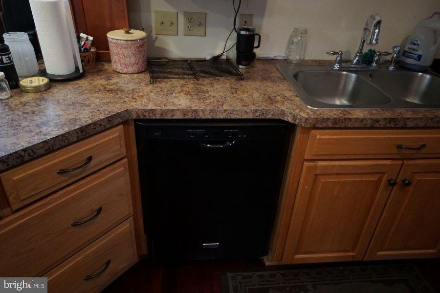 255 Troublesome Valley Road Franklin, WV 26807 - Photo 29 of 72 a bathroom with a granite countertop sink and toilet